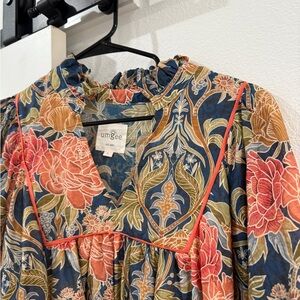 Umgee Navy Floral Ruffle Neck Peasant Top with Coral Accents